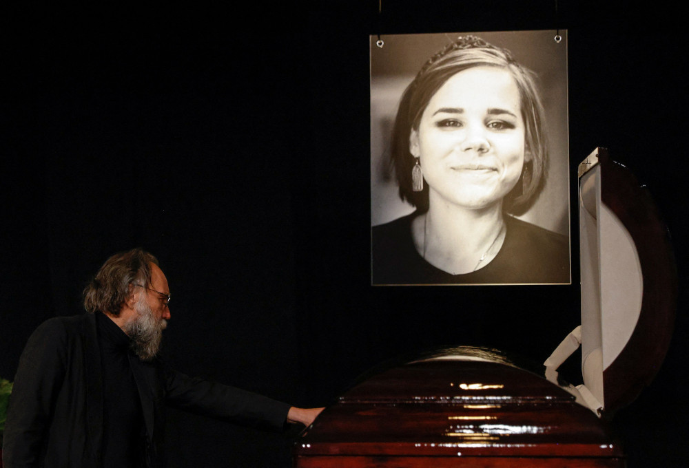 Russian political scientist and ideologue Alexander Dugin mourns for his daughter, Darya Dugina, who was killed in a car bomb attack, during a memorial service in Moscow Aug. 23, 2022.