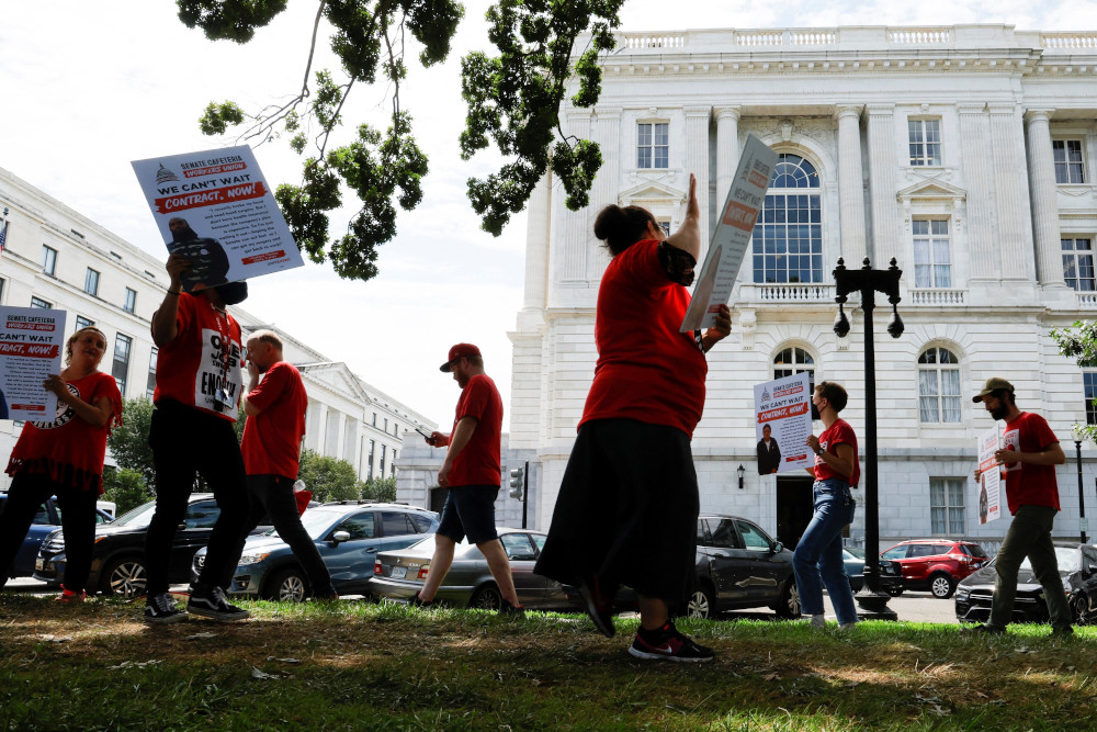 Union workers march for a new labor contract on Capitol Hill in Washington Aug. 2. (CNS/Reuters/Jonathan Ernst)