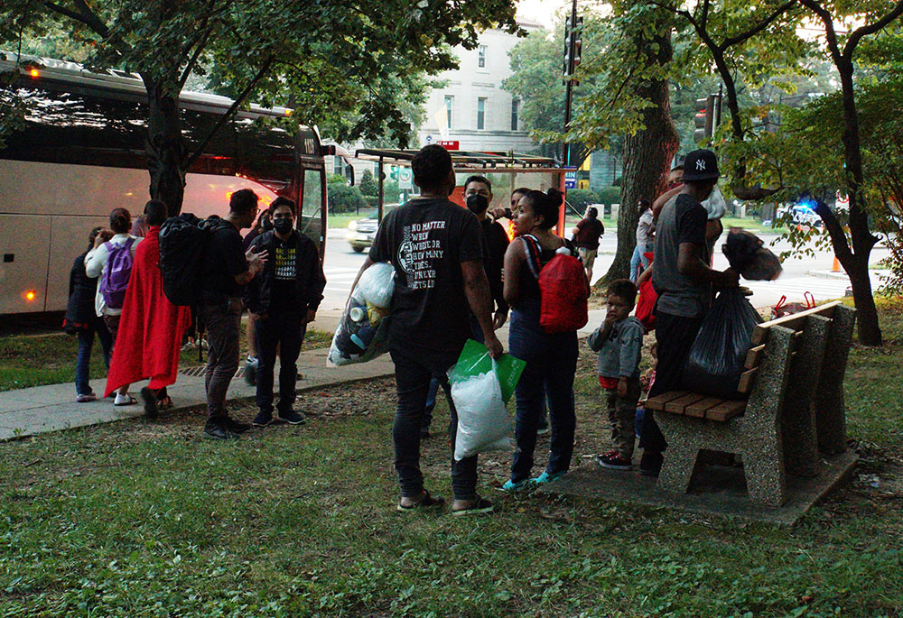 A group of mainly Venezuelan migrants sent by bus to Washington from detention in Texas are dropped off Sept. 17 outside the Naval Observatory, the official residence of Vice President Kamala Harris. (CNS/Reuters/Marat Sadana) A group of mainly Venezuelan migrants sent by bus to Washington from detention in Texas are dropped off Sept. 17 outside the Naval Observatory, the official residence of Vice President Kamala Harris. (CNS/Reuters/Marat Sadana)