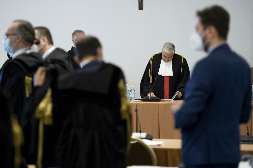 Judge Giuseppe Pignatone presides at the third session of the trial of six defendants accused of financial crimes, at the Vatican City State criminal court Nov. 17, 2021