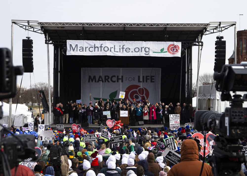 Jeanne Mancini, president of March for Life, concludes the annual March for Life rally in Washington alongside other supporters Jan. 21, 2022. (CNS photo/Tyler Orsburn)