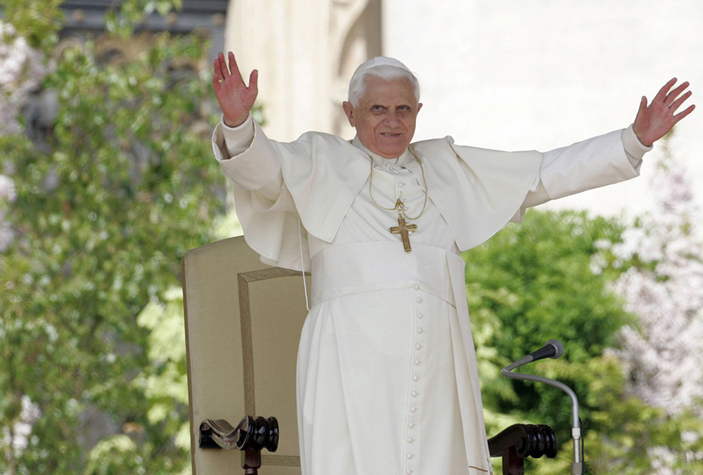 Pope Benedict XVI greets the faithful as he leads his weekly general audience in St. Peter's Square at the Vatican April 11, 2007. (CNS/Reuters/Dario Pignatelli)