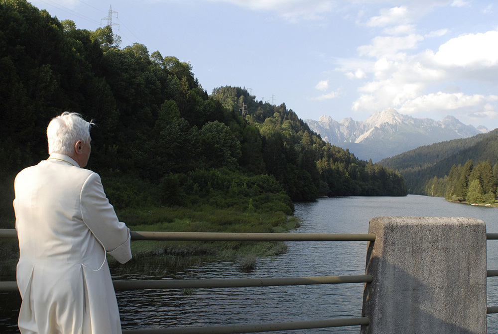 Pope Benedict XVI admires the scenery in Lorenzago di Cadore, Italy, while on vacation in the Alps July 23, 2007. (CNS/L'Osservatore Romano via Reuters)