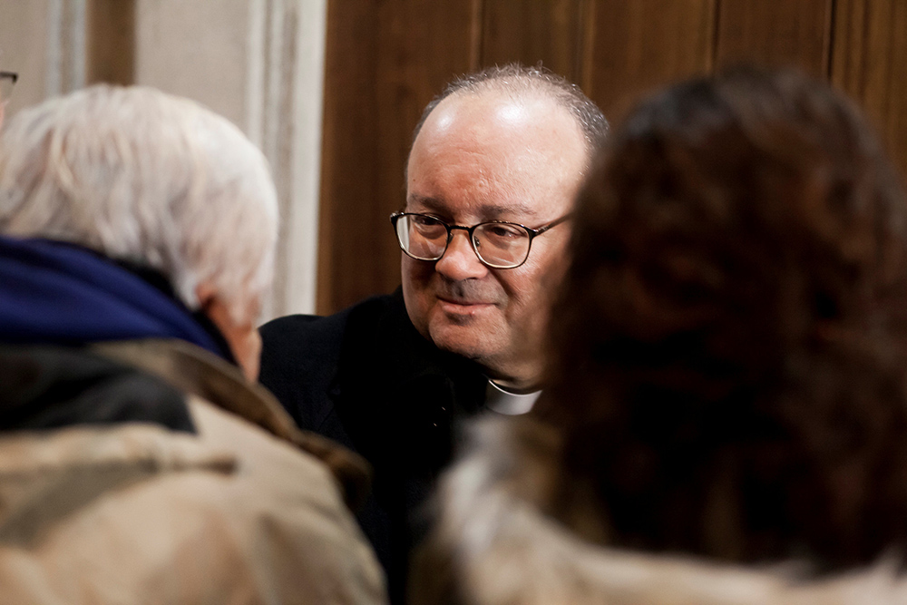 Archbishop Charles Scicluna of Malta speaks with members of the Catholic community inside a church in Osorno, Chile, June 14, 2018. Scicluna was on a pastoral mission in Osorno to promote healing in the wake of a clerical sexual abuse crisis. (CNS/Reuters/Fernando Lavoz)