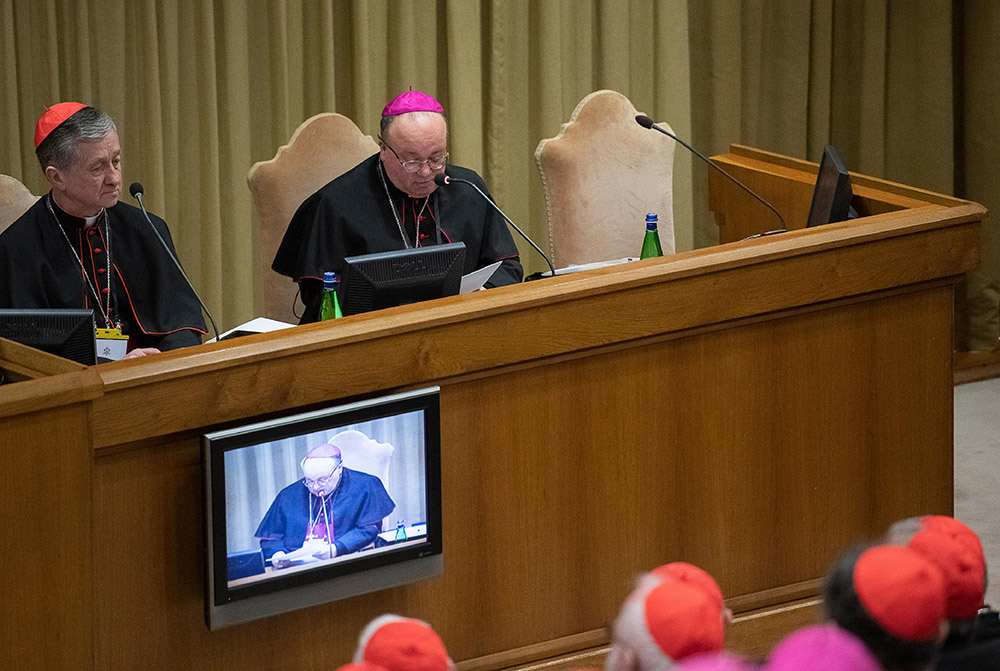 Chicago Cardinal Blase Cupich, left, and Malta Archbishop Charles Scicluna attend the opening session of the Vatican summit on the protection of minors in the church Feb. 21, 2019. (CNS/Vatican Media)