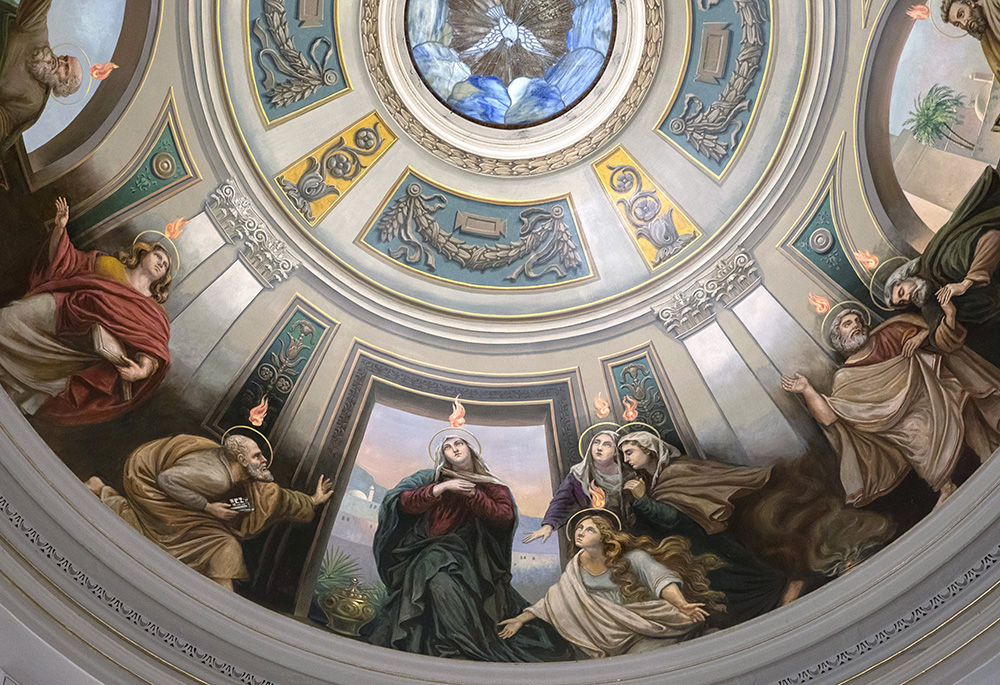 A painting on a Catholic church's ceiling depicts the Holy Spirit descending upon the apostles. (CNS/Octavio Duran)