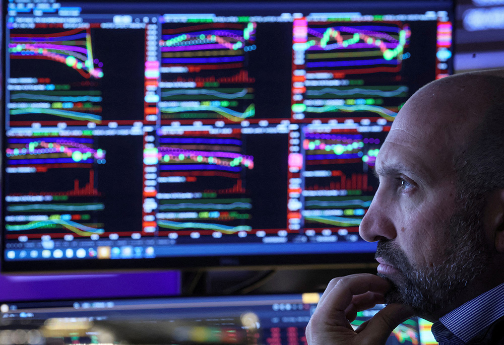 A trader works on the floor of the New York Stock Exchange June 14, 2022, in New York City. (CNS/Reuters/Brendan McDermid)