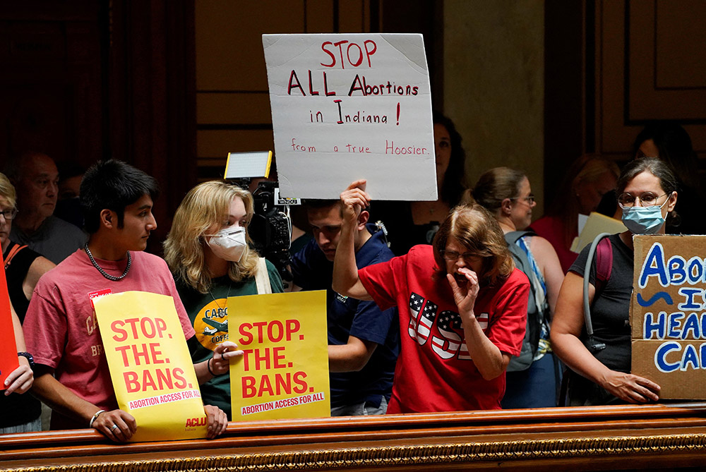 Activists protest inside the Indiana Statehouse in Indianapolis July 25, 2022, during a special session debate on banning abortion. (CNS/Reuters/Cheney Orr)