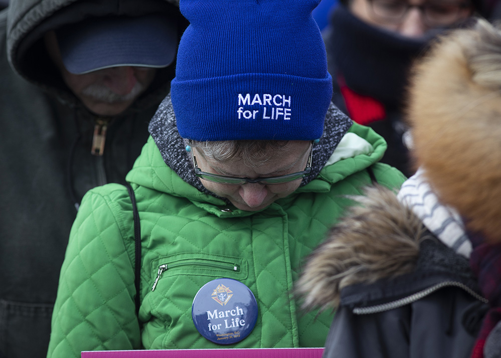Pro-life advocates pray during the annual March for Life in Washington Jan. 21, 2022. (CNS/Tyler Orsburn)