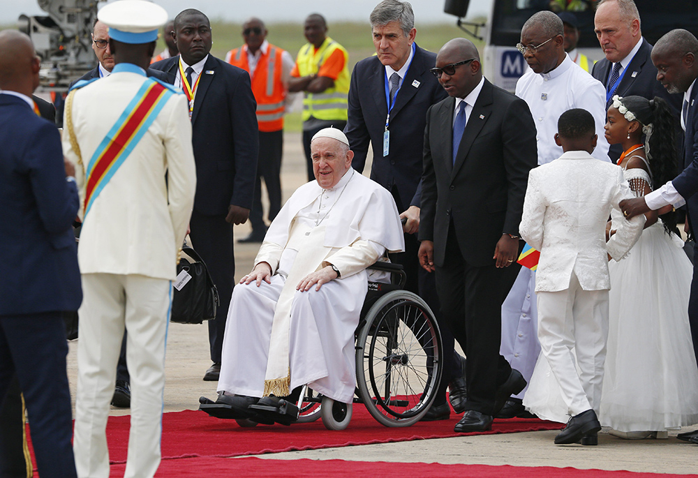 Pope Francis is welcomed by Prime Minister Sama Lukonde as he arrives at the international airport Jan. 31 in Kinshasa, Congo. (CNS photo/Paul Haring)