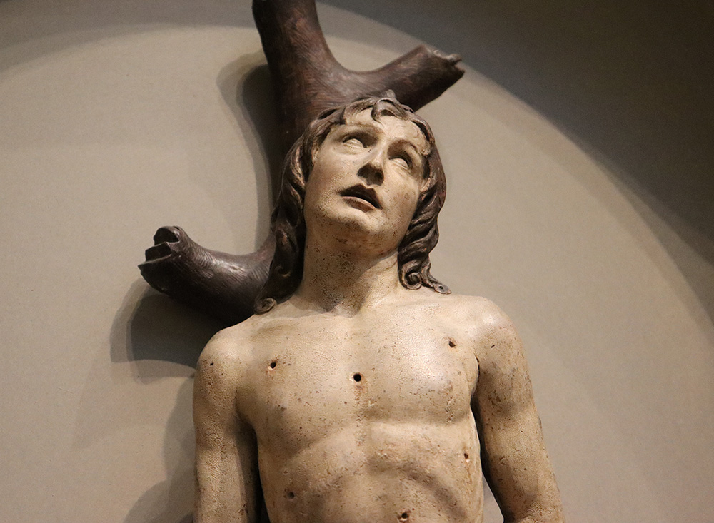 "St. Sebastian," 15th-century painted terra cotta sculpture by Matteo Civitali at the National Gallery of Art in Washington, D.C. (NCR photo/Teresa Malcolm)