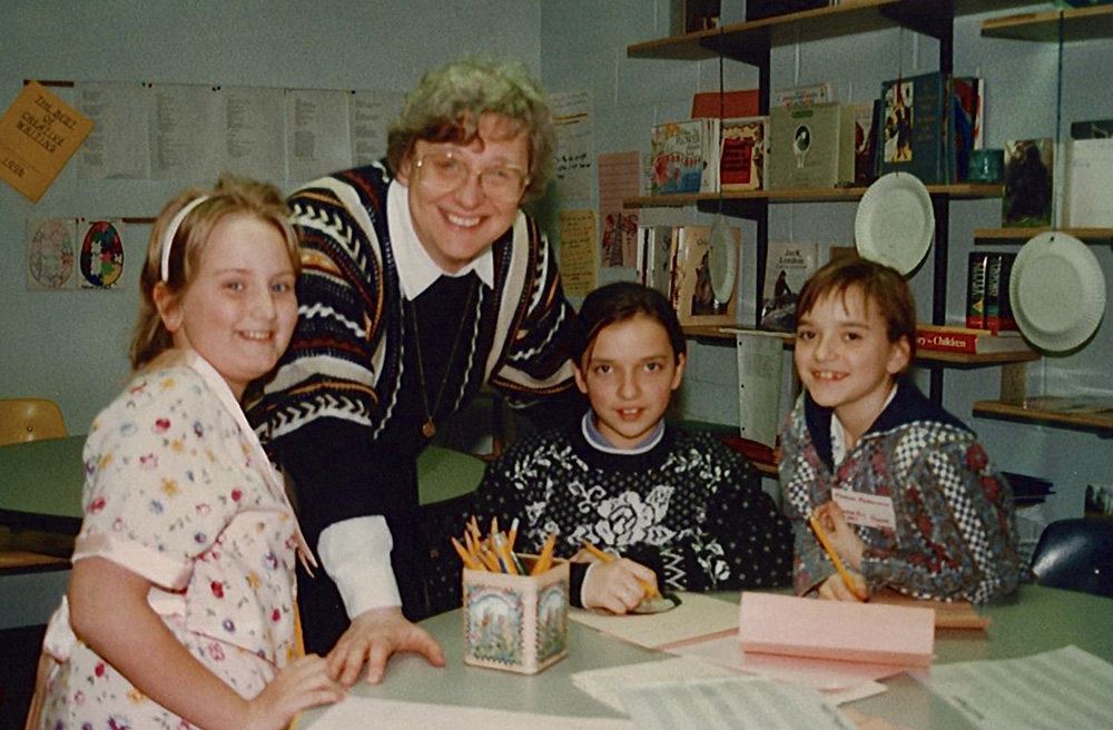 Benedictine Sr. Mary Lou Kownacki with children from the Inner-City Neighborhood Art House in an undated photo (Courtesy of Benedictine Sisters of Erie)