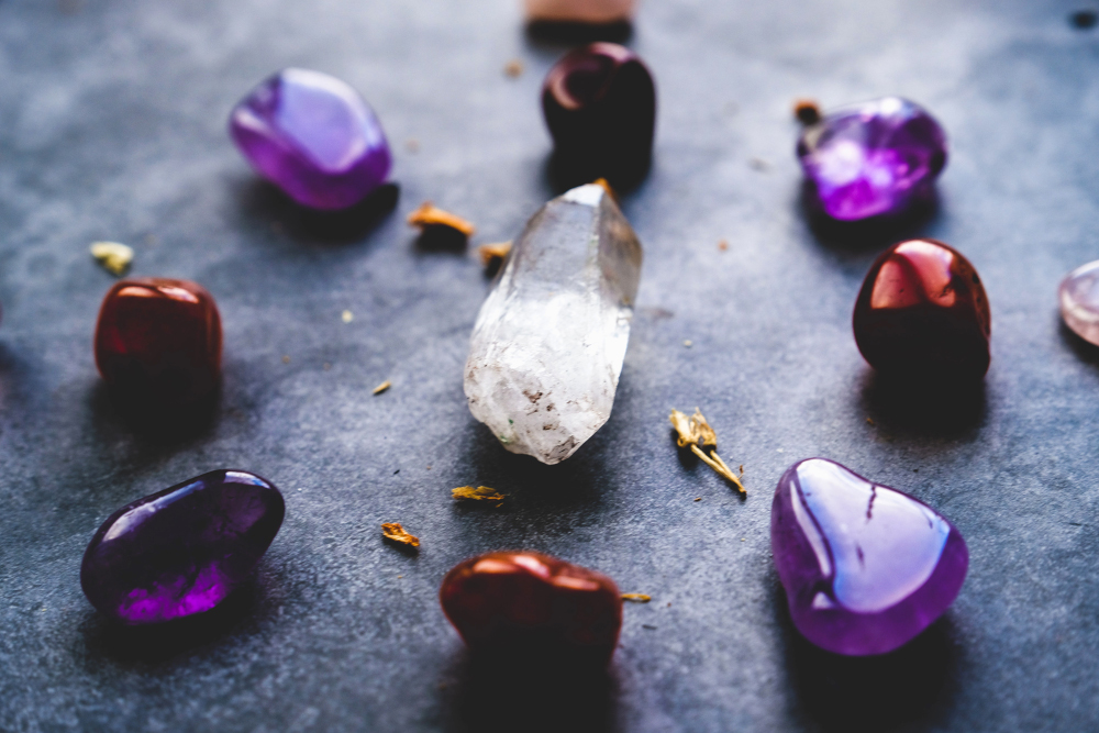 White and purple crystals sit in a circle