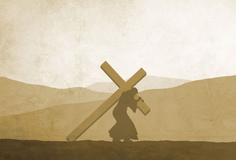 Jesus carries the cross.