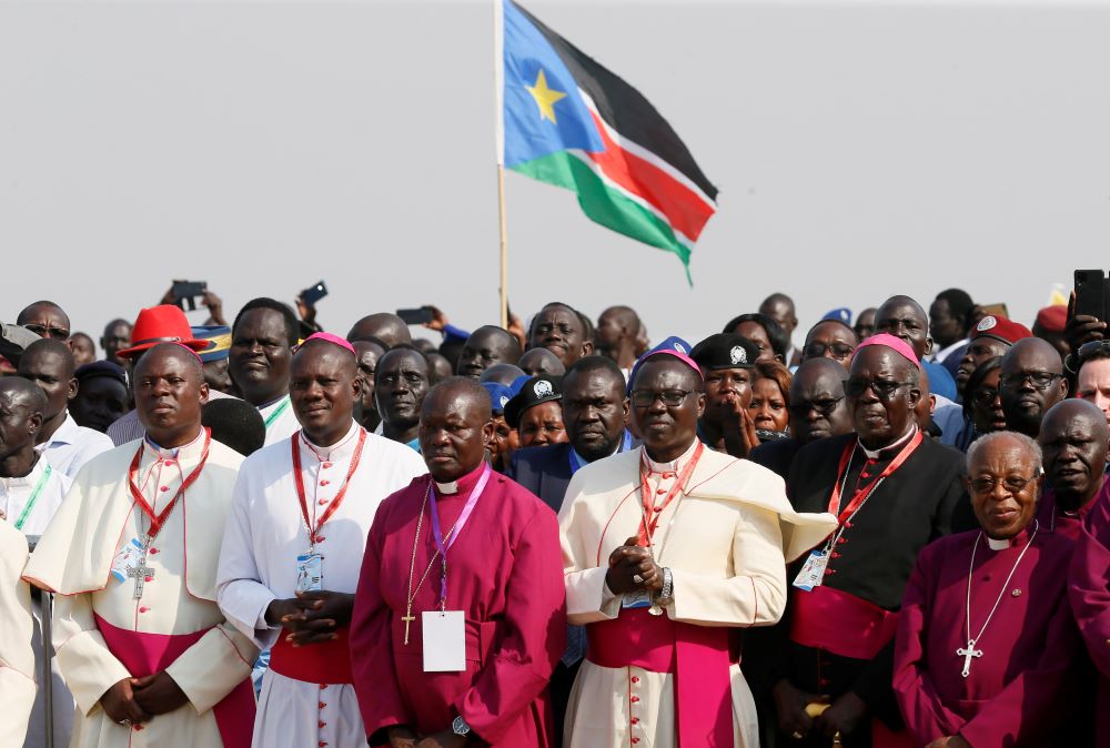 Prelates watch as Pope Francis arrives at the international airport in Juba, South Sudan, Feb. 3. (CNS/Paul Haring)