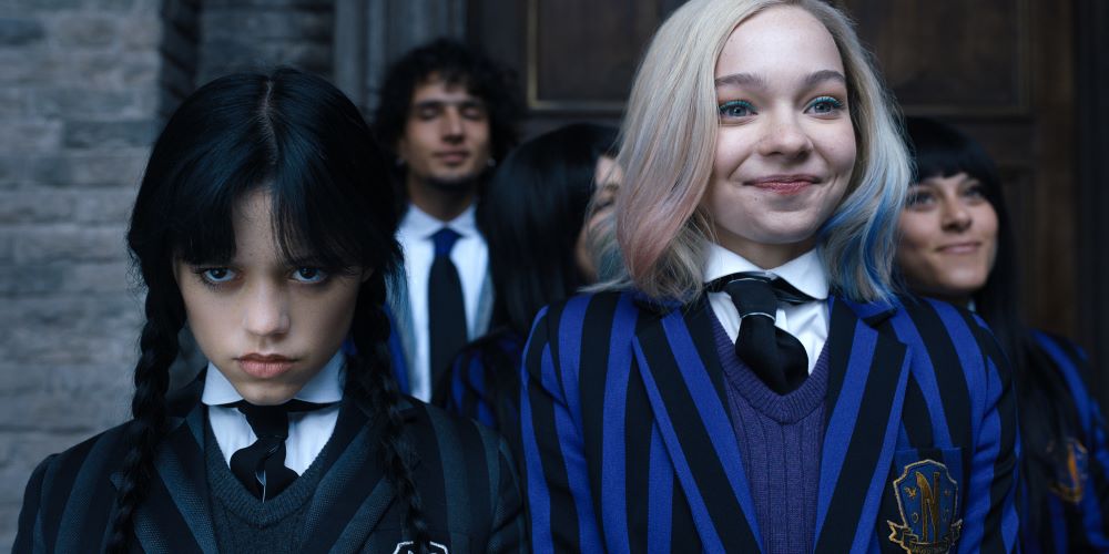 Jenna Ortega plays Wednesday Addams, and Emma Myers plays Enid Sinclair, her roommate