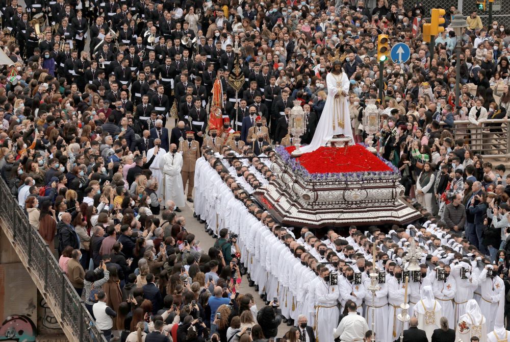 A large statue of Christ is carried during Holy Week celebrations in Málaga, Spain, April 11, 2022.