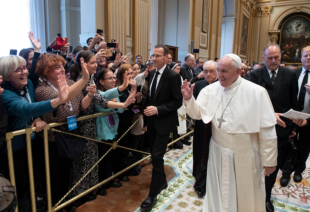 Pope Francis greets people during an audience with participants in a meeting sponsored by the Pontifical Council for Promoting New Evangelization, Nov. 30, 2019, at the Vatican. Bishops, religious and laypeople were taking part in a meeting to discuss the pope's apostolic exhortation, Evangelii Gaudium ("The Joy of the Gospel"). (CNS/Vatican Media)