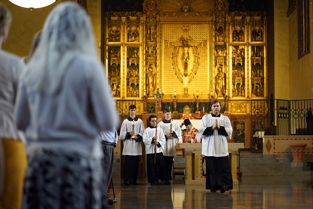 Altar servers lead the closing procession during a Tridentine Mass at Immaculate Conception Seminary in Huntington, New York, on July 1, 2021. (CNS/Gregory A. Shemitz)
