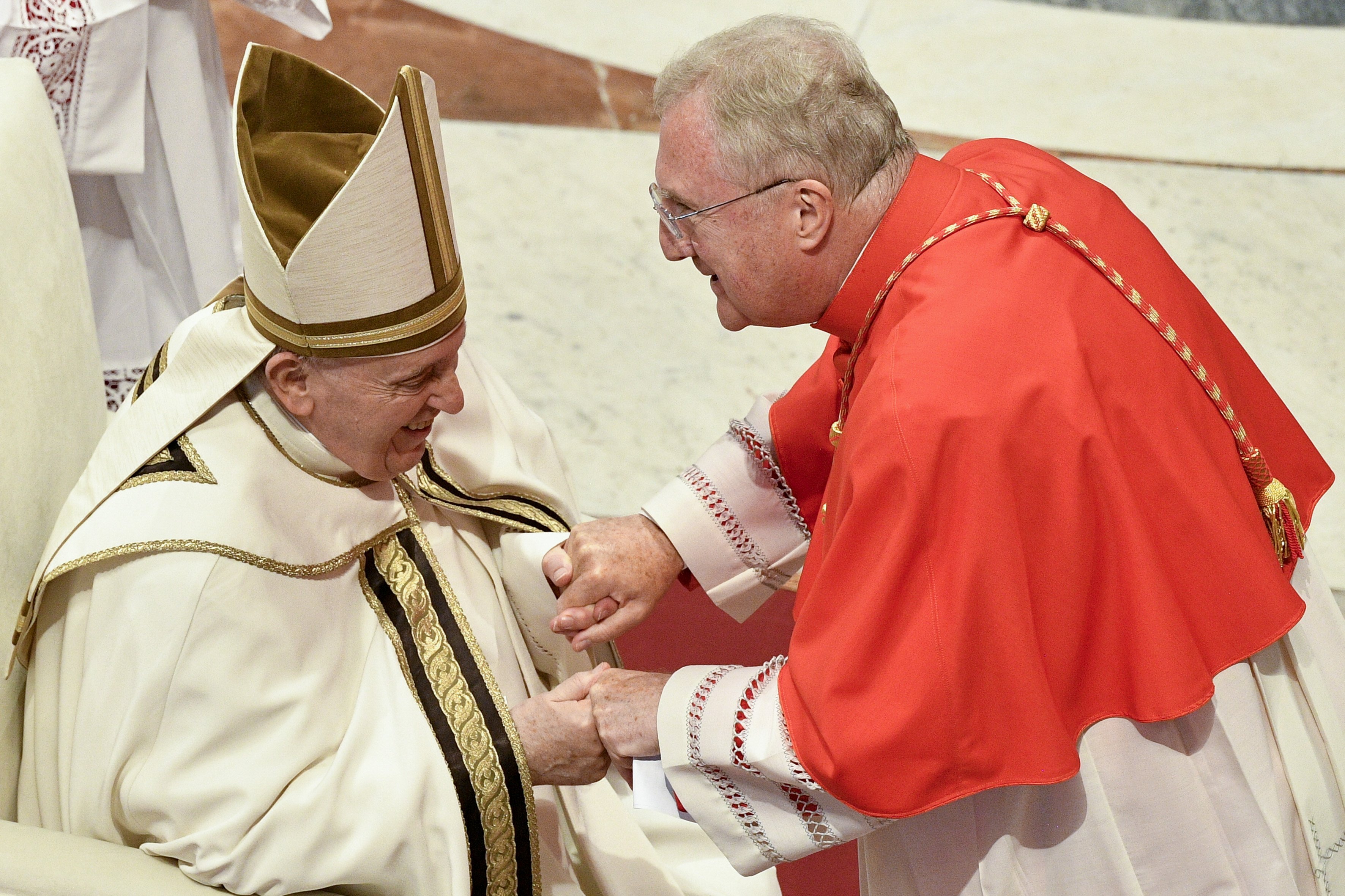Pope Francis greets new English Cardinal Arthur Roche, prefect of the Dicastery for Divine Worship and the Sacraments, during a consistory for the creation of 20 new cardinals in St. Peter's Basilica at the Vatican Aug. 27, 2022. (CNS photo/Vatican Media)