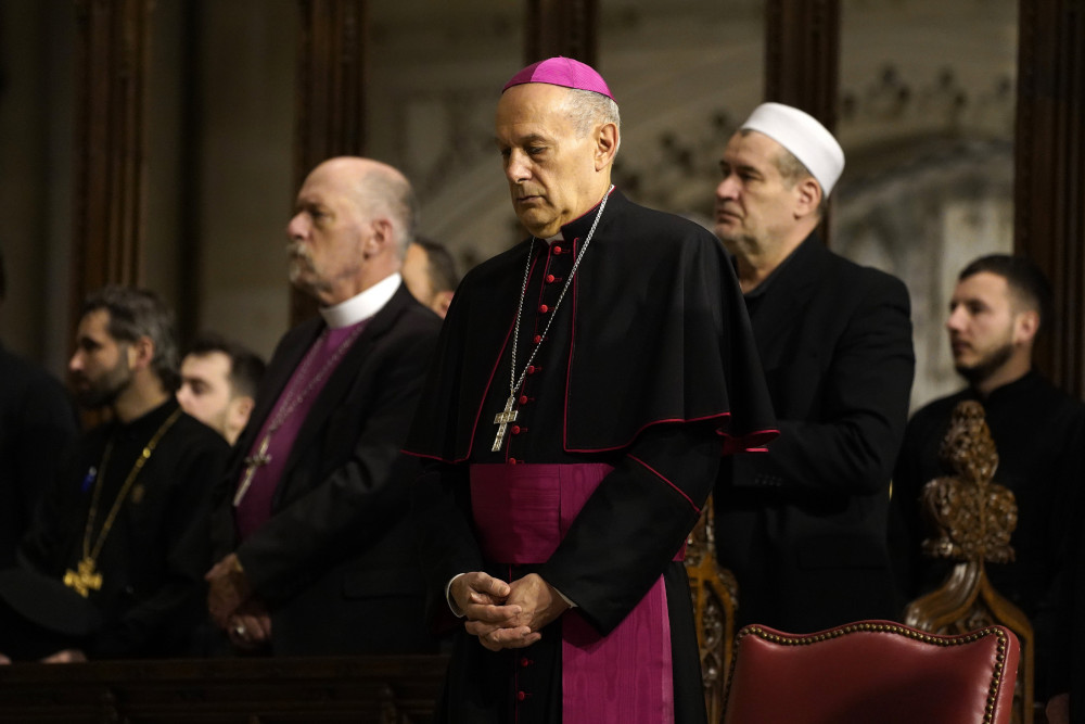 Archbishop Gabriele Caccia, the Vatican's permanent observer to the United Nations, is seen in the sanctuary during an ecumenical prayer service for peace in Ukraine at St. Patrick's Cathedral in New York City Feb. 18, 2023. (OSV News photo/Gregory A. Shemitz)