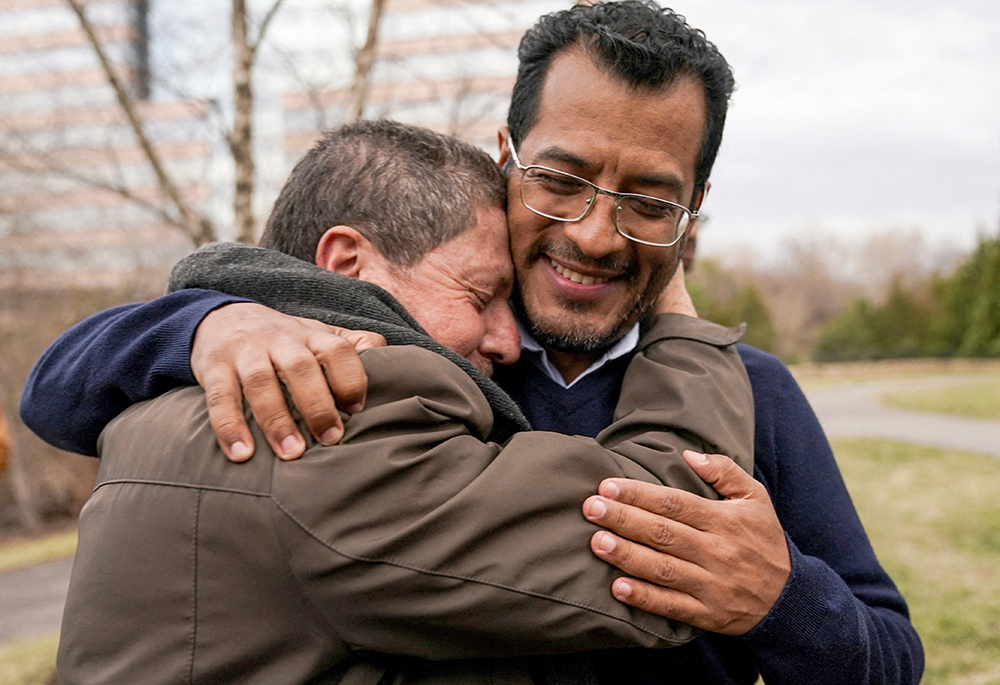 Former Nicaraguan presidential hopeful Félix Maradiaga, one of the more than 200 freed political prisoners from Nicaragua, is embraced by a supporter outside a hotel after arriving in the U.S. at Dulles International Airport Feb. 9 in Virginia. (OSV News/Reuters/Kevin Lamarque)