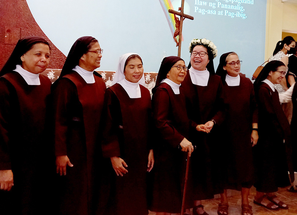 The Discalced Carmelites of Infanta, Quezon province, prayed a novena to support the marchers against Kaliwa Dam. The nuns are seen here during the silver jubilee for profession of Mother Prioress Dulce Inlayo in October 2022. (Ma. Ceres P. Doyo)