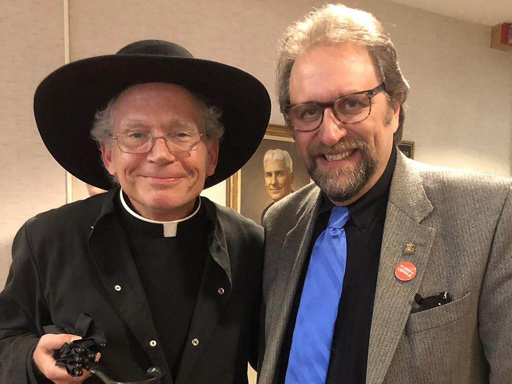 Kevin O'Brien, left, as G.K. Chesterton's fictional detective, Father Brown, is seen with Dale Ahlquist in an undated photo. (Courtesy of Kevin O'Brien)