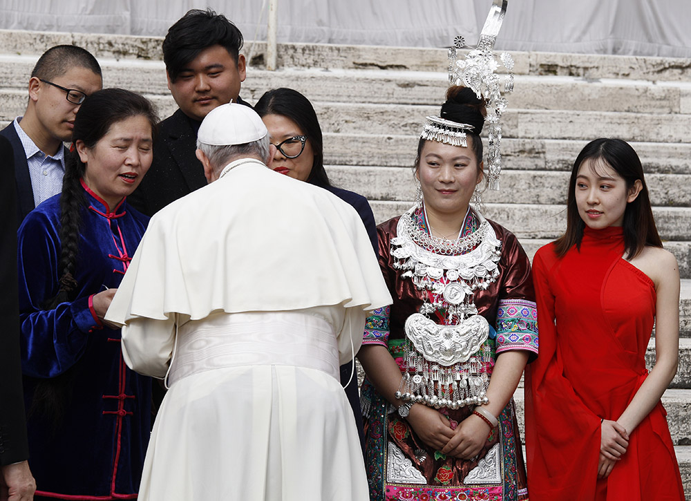 Pope Francis greets pilgrims from China during his general audience in St. Peter's Square at the Vatican March 28, 2018. (CNS/Paul Haring)