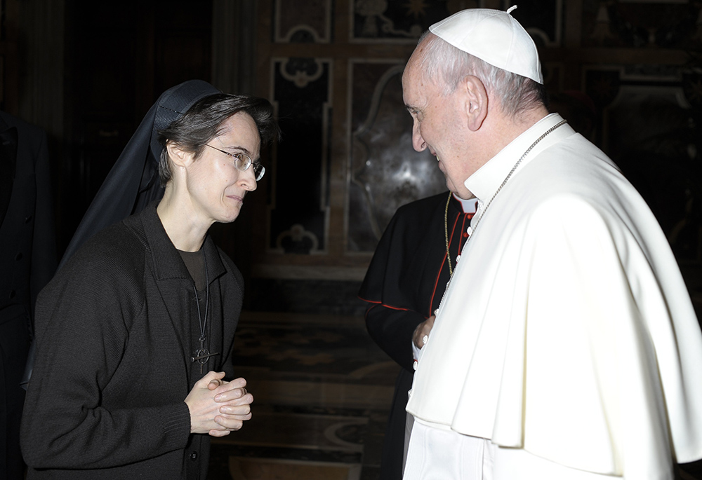 Pope Francis greets Sr. Raffaella Petrini, an Italian member of the U.S.-based Franciscan Sisters of the Eucharist, Dec. 3, 2015, at the Vatican. The pope named Petrini to be secretary-general of the office governing Vatican City State. (CNS/Vatican Media)