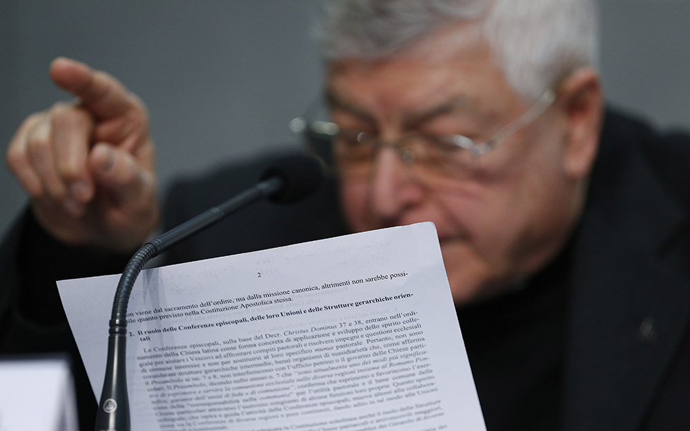 Then-Fr. Gianfranco Ghirlanda, a Jesuit canon lawyer, speaks at a news conference to present Pope Francis' document, Praedicate Evangelium, for the reform of the Roman Curia, during a news conference at the Vatican March 21, 2022. (CNS/Paul Haring)