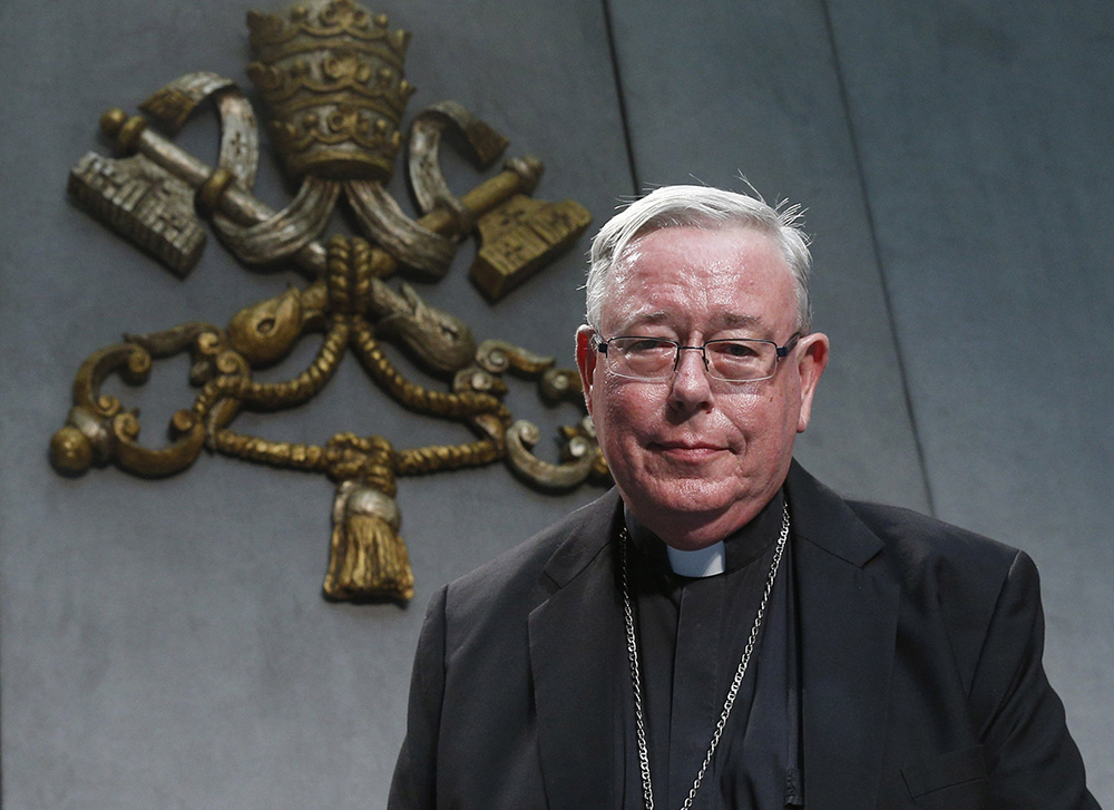 Cardinal Jean-Claude Hollerich of Luxembourg, relator general of the Synod of Bishops, arrives for a news conference to present an update on the synod process at the Vatican Aug. 26, 2022. (CNS/Paul Haring)