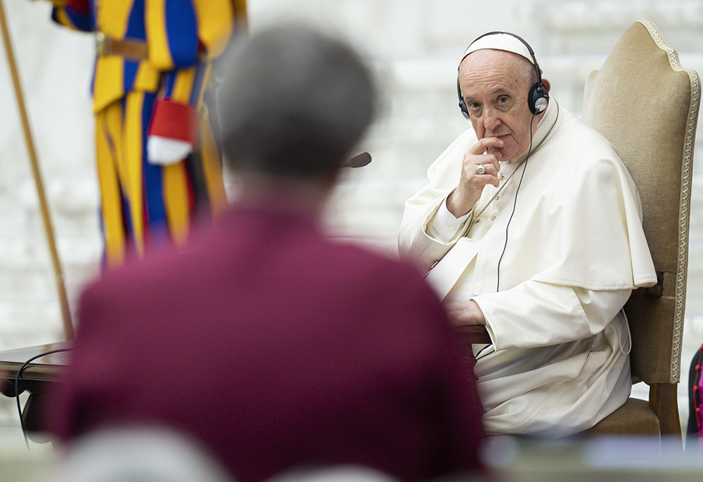 Pope Francis listens during an audience with participants in the plenary assembly of the women's International Union of Superiors General May 5, 2022, at the Vatican. (CNS/Vatican Media)