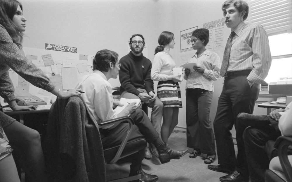 Young staffers in the Washington, D.C., office of the Oct. 15, 1969, Moratorium including co-organizers David Hawk (seated) and Sam Brown (far right, wearing tie). (PBS/Courtesy of Library of Congress)