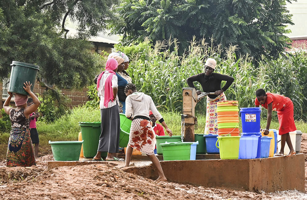 Women collect water in Blantyre, southern Malawi, March 17. (AP/Thoko Chikondi)