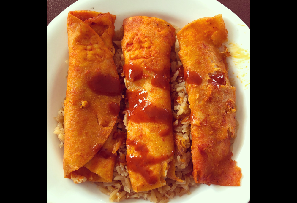 Enchiladas are pictured. The parade of meals Gustavo Arellano's aunts have sent him every week this spring have led to a necessary reminder about the true meaning of Lent. (Courtesy of Gustavo Arellano)