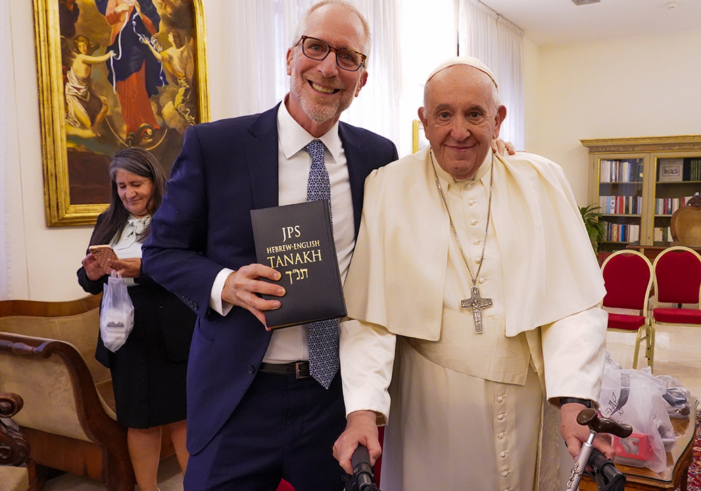 Rabbi John Linder gives Pope Francis a copy of the Hebrew Bible during a visit with the pontiff October 2022 at the Vatican. (Courtesy of Rabbi John Linder)
