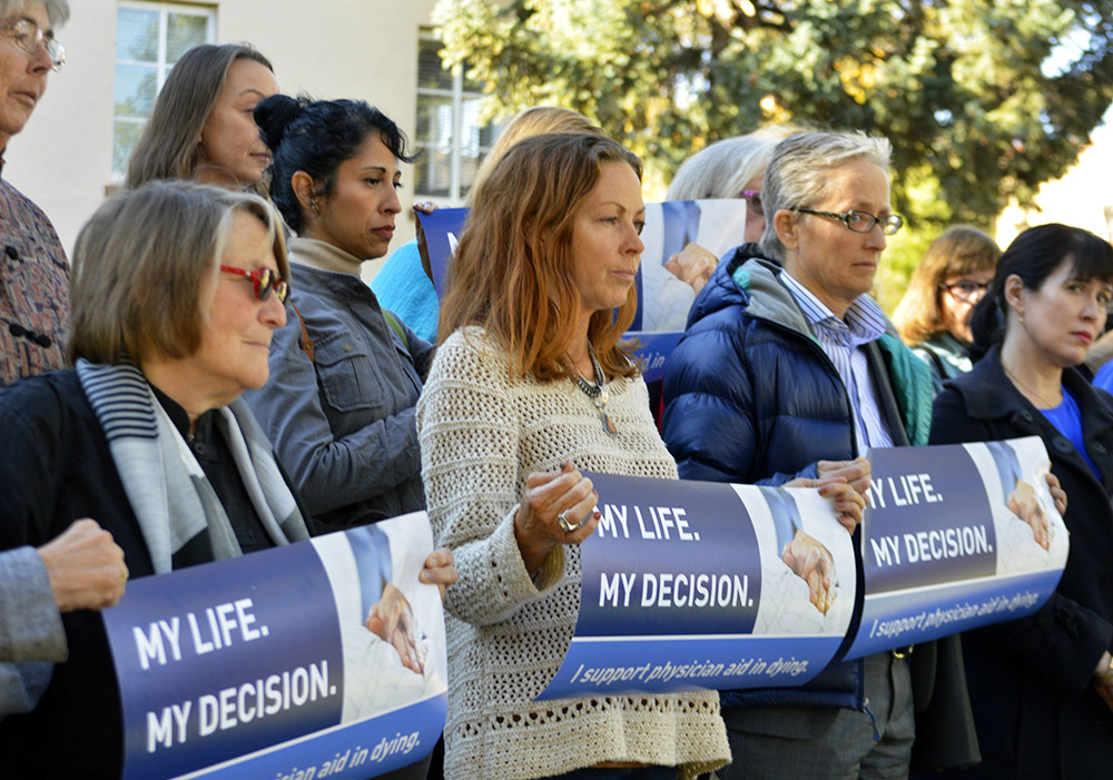 In an Oct. 26, 2015, file photo, supporters of legal physician-assisted suicide rally outside the New Mexico Supreme Court in Santa Fe. (AP/Russell Contreras, File)