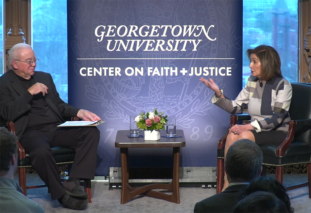 Former U.S. House Speaker Nancy Pelosi speaks to the Rev. Jim Wallis, director of the Georgetown University Center on Faith and Justice, March 23 at Georgetown University in Washington, as part of an inaugural conversation in the new series Higher Calling, where political leaders and public servants will speak about the role of faith and ethics in their lives. (NCR screenshot)