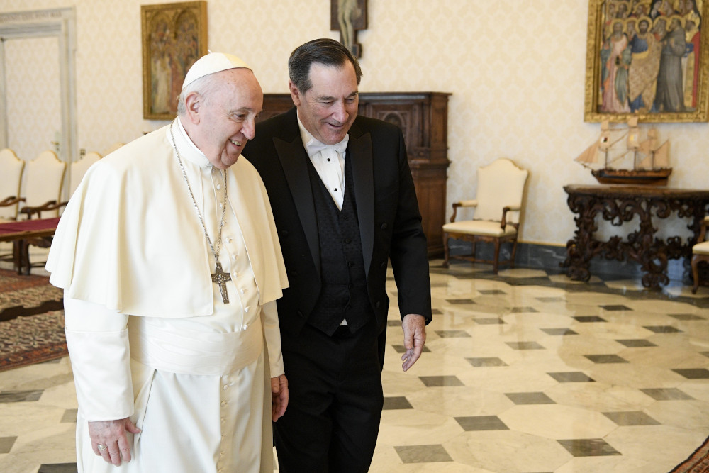 Pope Francis walks with Joe Donnelly, new U.S. ambassador to the Holy See, during a meeting for the ambassador to present his letters of credential, at the Vatican April 11, 2022. (CNS/Vatican Media)