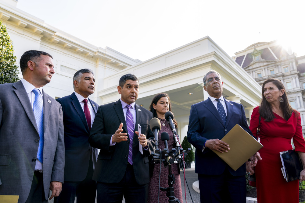 Congressional Hispanic Caucus Chairman Rep. Raul Ruiz, D-California, accompanied by from left, Rep. Darren Soto, D-Florida, Rep. Tony Cardenas, D-California, Rep. Nanette Barragan, D-California, Rep. Adriano Espaillat, D-New York, and Rep. Teresa Leger Fernandez, D-New Mexico, speaks to members of the media following a meeting with President Joe Biden at the White House in Washington on April 25. (AP/Andrew Harnik)
