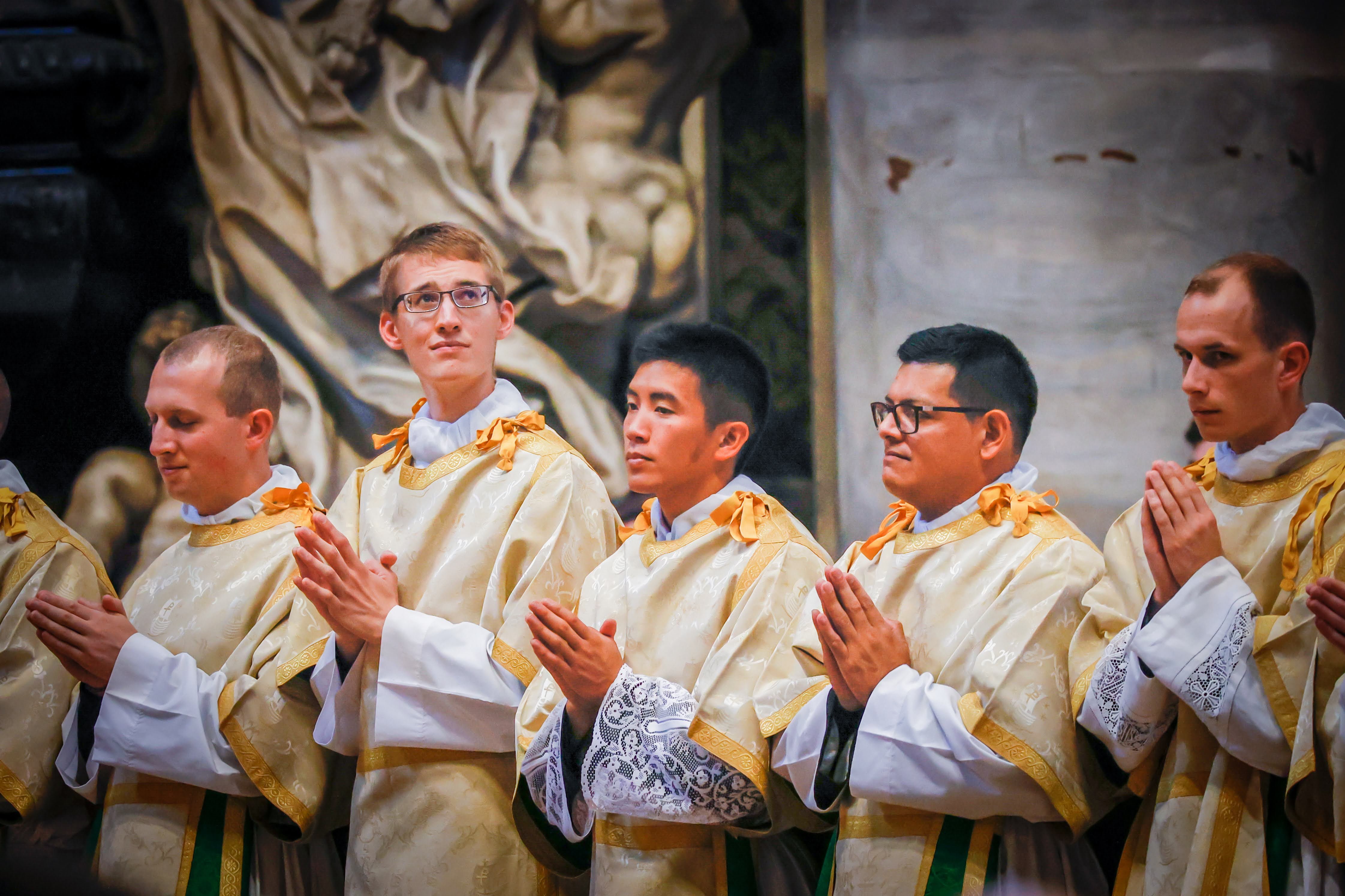 Deacon Zane Langenbrunner, second from left, at his Sept. 29, 2022, ordination as a transitional deacon in St. Peter's Basilica at the Vatican. Deacon Langenbrunner, an Indiana native, was selected to chant the Exsultet at the April 8, 2023, Easter Vigil with Pope Francis in St. Peter's Basilica. (OSV News photo/Jennifer Barton, Today's Catholic)