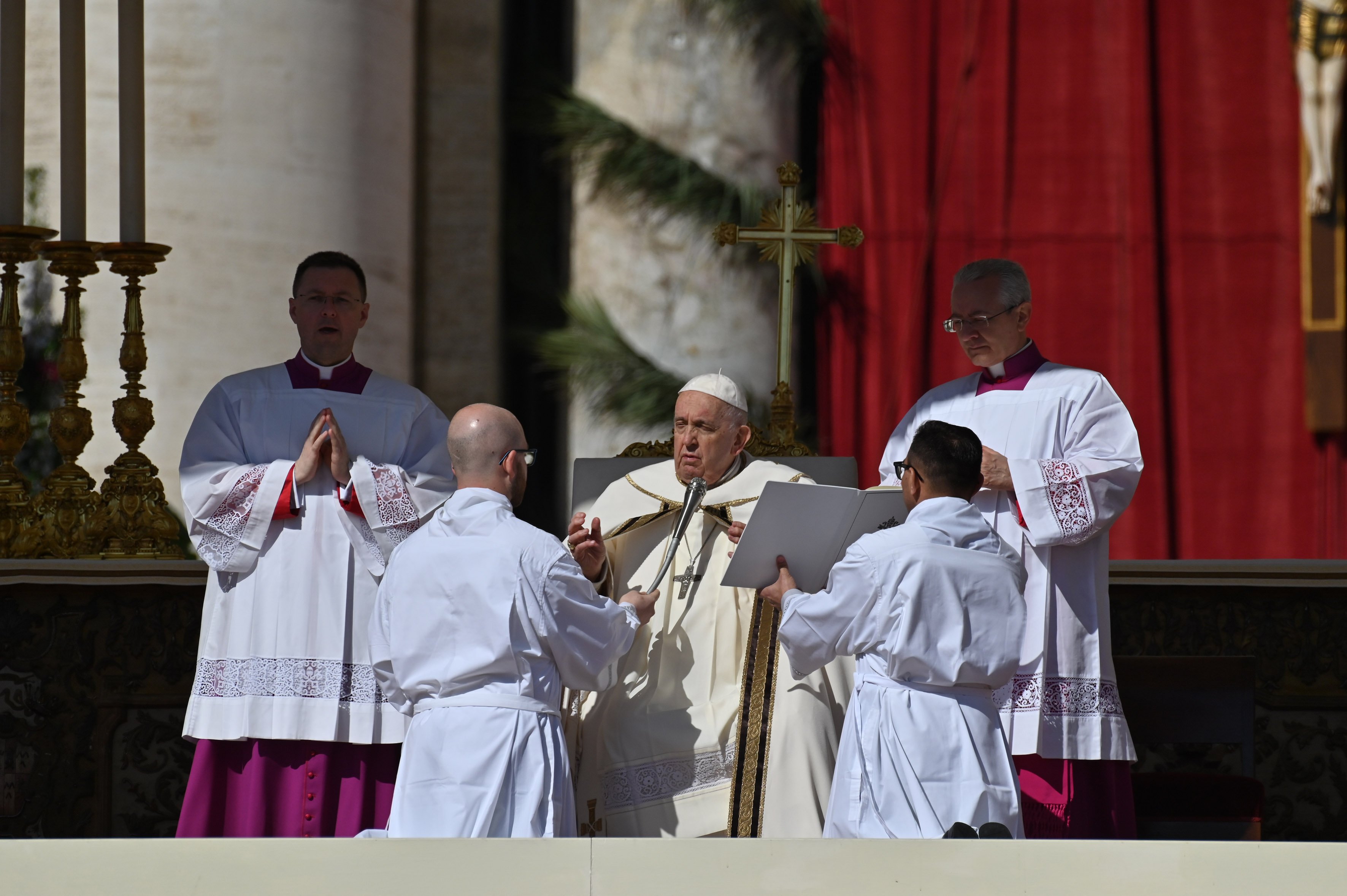 Pope Francis recites the opening prayer as he celebrates Easter morning Mass in St. Peter's Square at the Vatican April 9, 2023. (CNS photo/Chris Warde-Jones)
