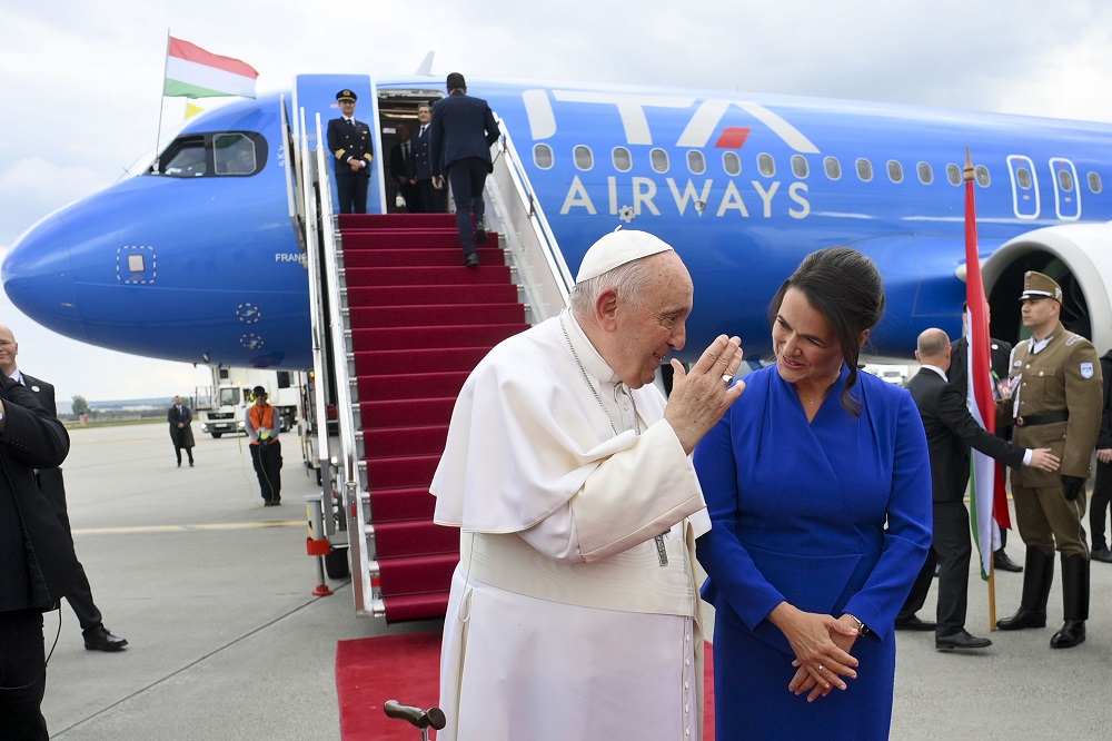 Pope Francis speaks with Hungarian President Katalin Novák during a farewell ceremony in Budapest, Hungary, April 30, 2023. The pontiff concluded his three-day visit to the country. 