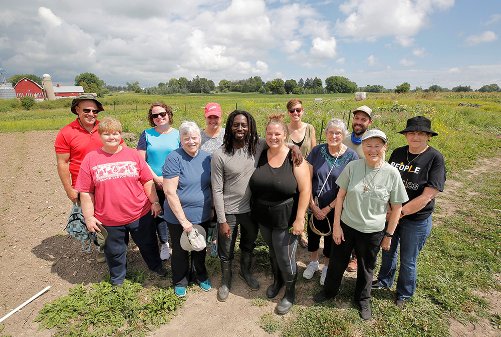 Sisters and staff of Milwaukee-area religious communities tour Full Circle Healing Farm, a community farm dedicated to racial and food justice operated by Martice and Amy scales. Martice has been active in national advocacy for a Farm Bill that prioritizes land access for BIPOC farmers.