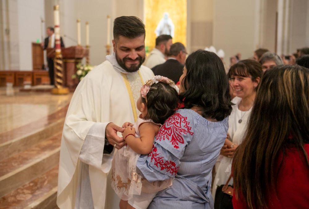 Fr. Luis Garcia is seen during a Mass of ordination to the priesthood at the Co-Cathedral of the Sacred Heart in Houston June 4, 2022. Father Garcia was one of two Hispanic and Latino priests ordained in Galveston-Houston that year. A new Hispanic Serra Club, the first to be established in the Archdiocese of Galveston-Houston, will promote and inspire new vocations to the priesthood and religious life with a focus on Hispanic and Latino populations. (CNS photo/ Texas Catholic Herald/James Ramos)