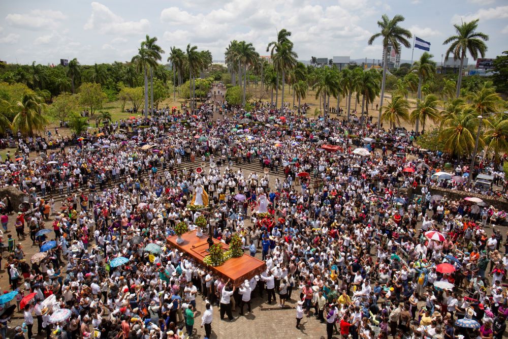 People gather for a Good Friday procession outside the Metropolitan Cathedral in Managua, Nicaragua April 7, as the government banned Holy Week street processions this year due to unspecified security concerns. (OSV News/Reuters)