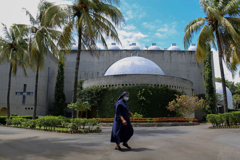 A religious sister walks past the Metropolitan Cathedral of the Immaculate Conception of Mary in Managua, Nicaragua, Aug. 12, 2022. The Nicaraguan government has expelled multiple groups of women religious. (OSV News/Maynor Valenzuela, Reuters)
