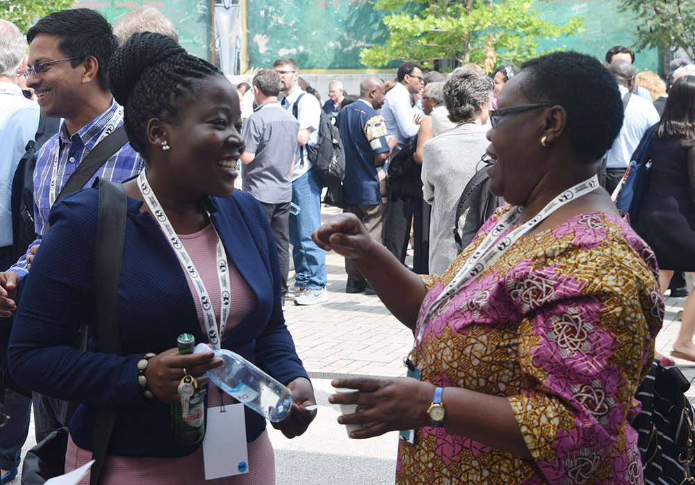 Theologian Teresia Mbari Hinga, right, converses with Uganda theologian Margaret Ssebunya during a conference hosted by Catholic Theological Ethics in the World Church in Sarajevo, Bosnia-Herzegovina, in July 2018. (NCR photo/Joshua J. McElwee)