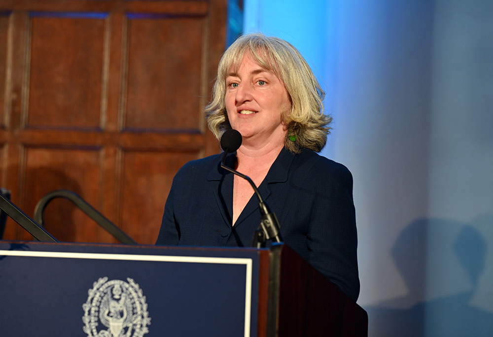 Jane Varner Malhotra, director of advancement communications at Georgetown University, speaking at the April 17 event on "Faith, Feminism, and Being Unfinished: The Question of Women's Ordination" (Courtesy of Georgetown University/Leslie E. Kossoff)